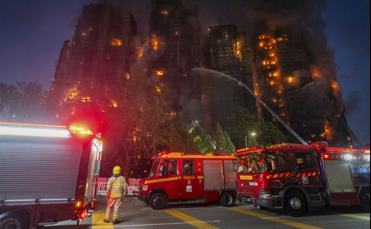 Firefighters work to extinguish a fire which broke out at Wang Fuk Court, a residential estate in the Tai Po district of Hong Kong’s New Territories, Wednesday, Nov. 26 2025. 